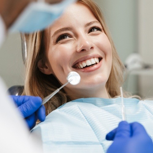 Woman receiving expert dentistry