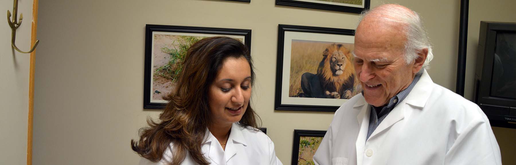 Dentists discussing extensive dental services