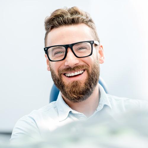 man smiling after cosmetic dentistry 