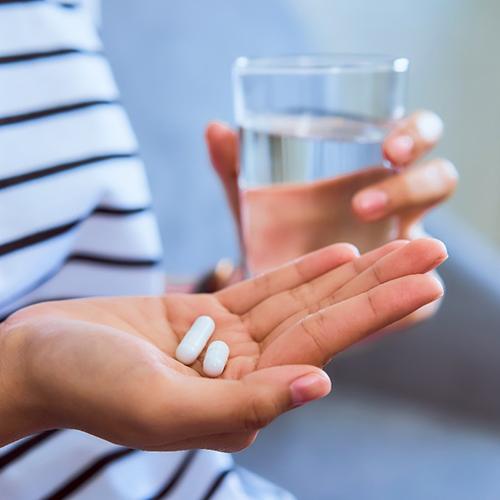 person taking medicine