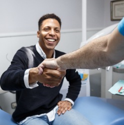 Man shaking hands with dentist