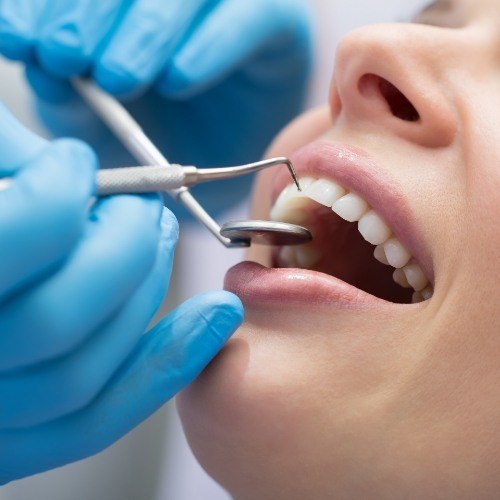 Patient receiving dental treatment