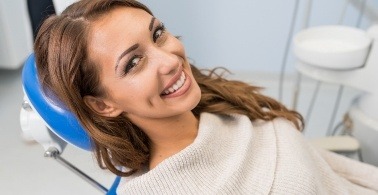 Woman smiling after preventive dentistry