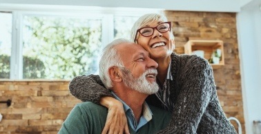 Man and woman with flawless smiles