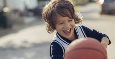 Young boy smiling after children's dentistry visit