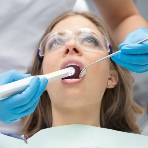 Dentist capturing digital x-rays