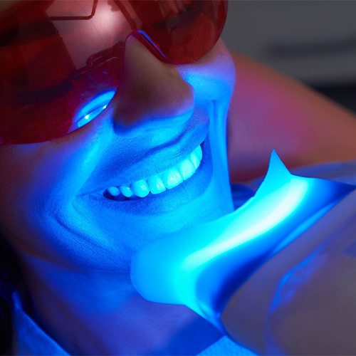 woman getting veneers in Holliston