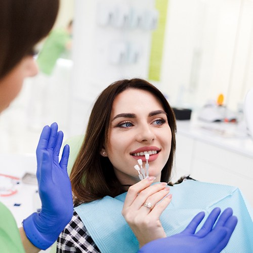 woman getting veneers in Holliston