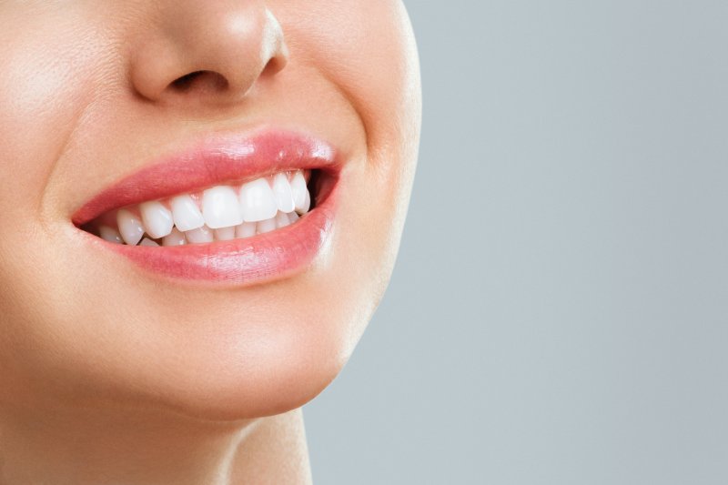 Close-up of a woman with straight teeth