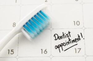 Dentist appointment and toothbrush on calendar 